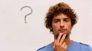 stock-footage-confused-student-standing-in-front-of-whiteboard-with-question-mark-at-the-university